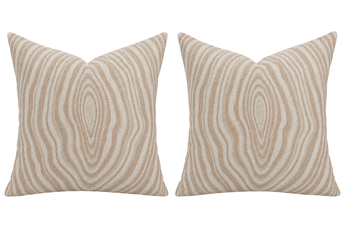 Concept mockup of 18 by 20 inch woodgrain pillows made with Jaclyn Smith Home for Trend fabric